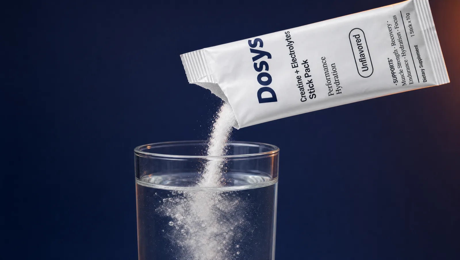 Dosys stick pack pouring powder into a glass of water