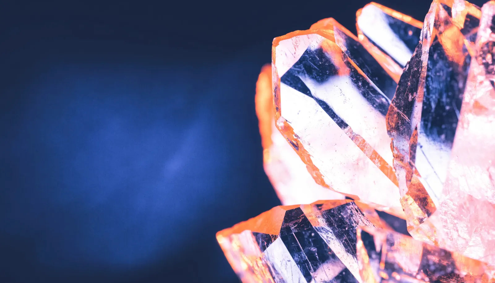 Macro of faceted translucent mineral crystal shards